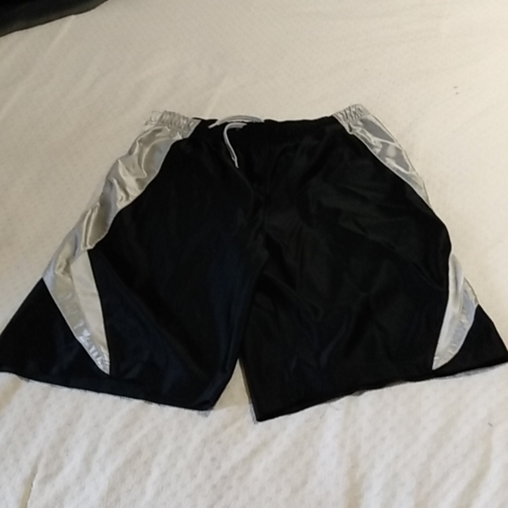 Boys Nike black and silver shorts